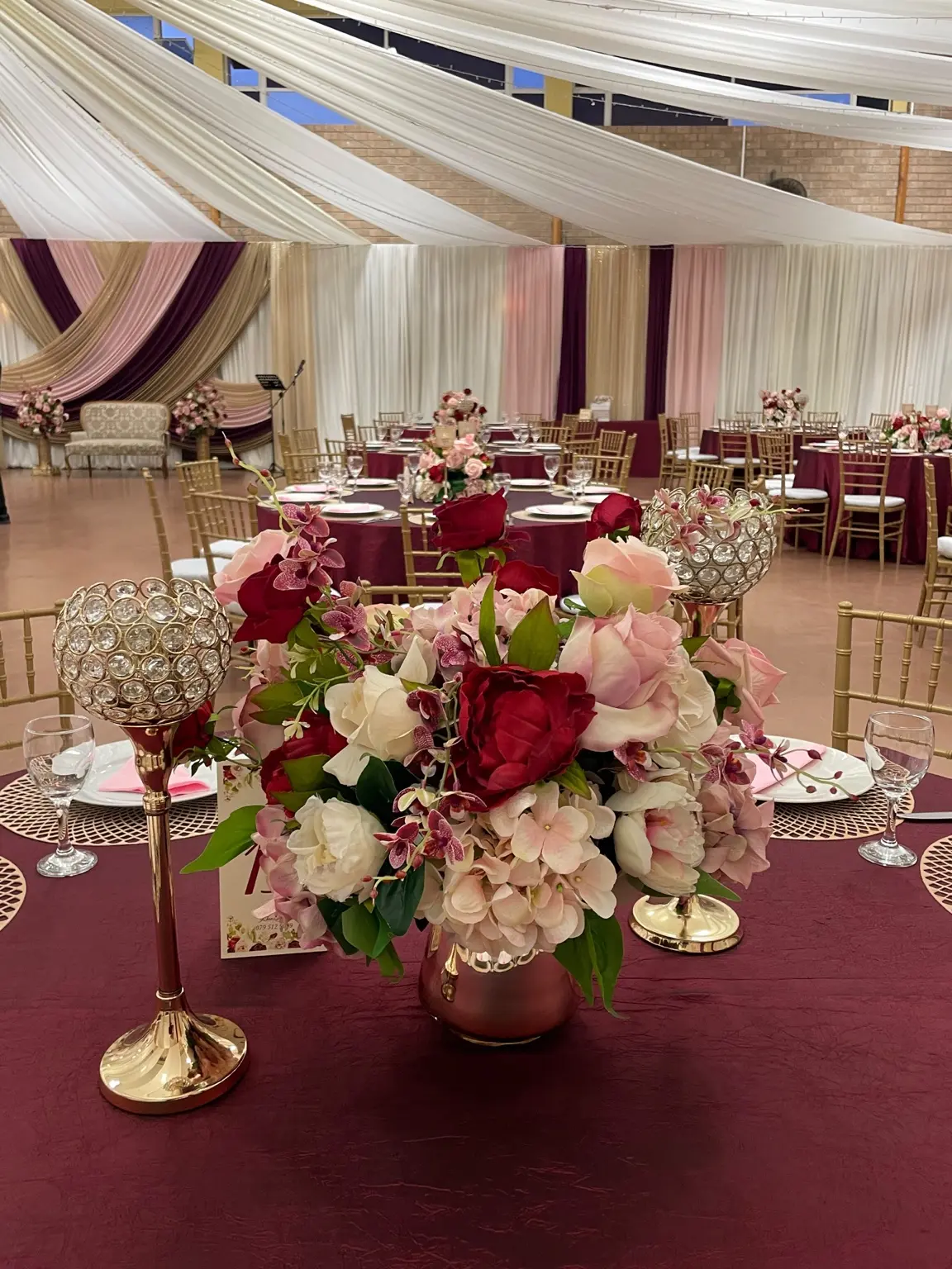 Plum and blush wedding reception styled by Khan Events