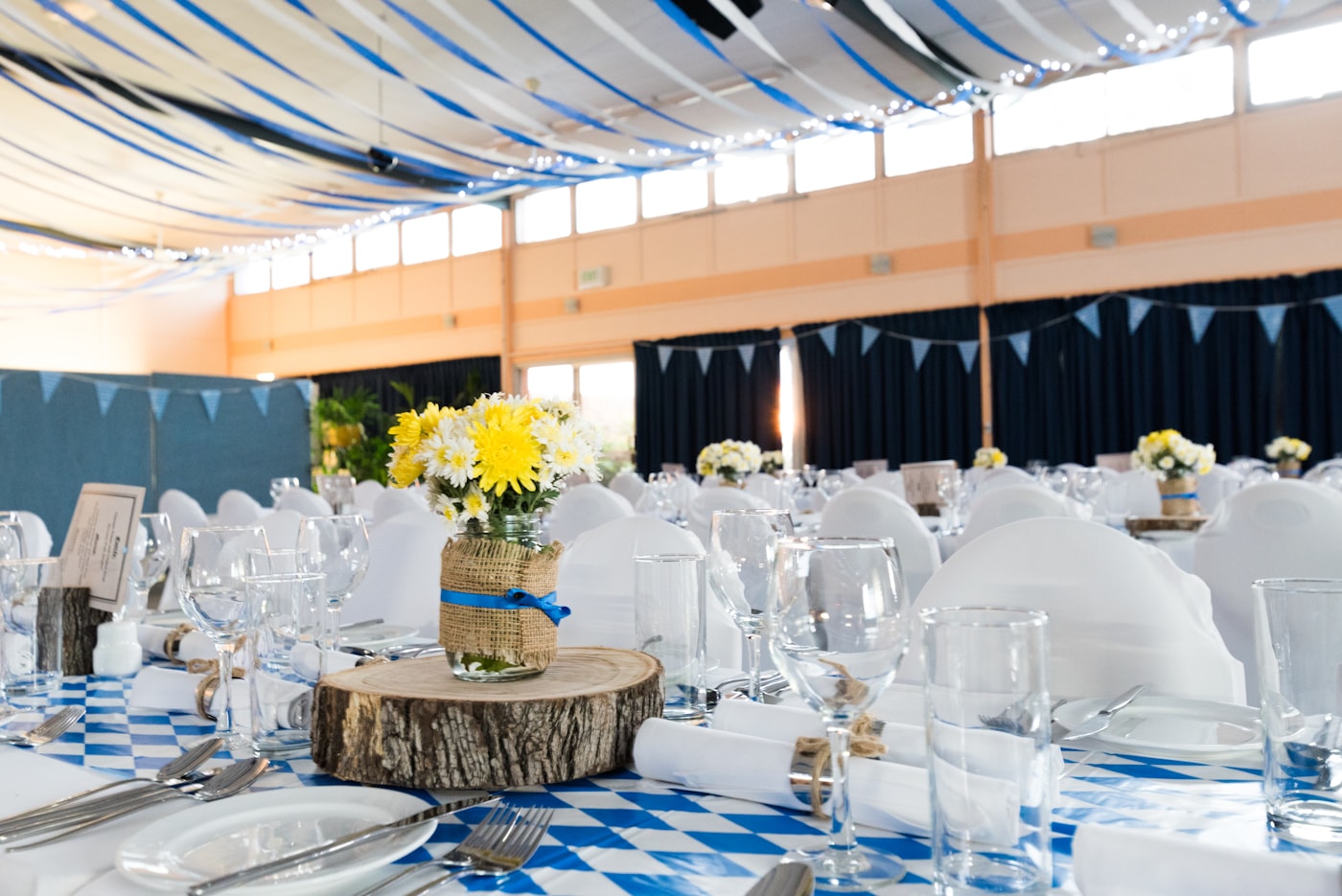 Elegant wedding reception styled with flowers and warm lighting